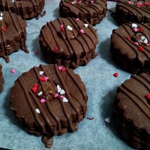 Jumbo Sandwich chocolate Cookies with Nutella on a baking tray