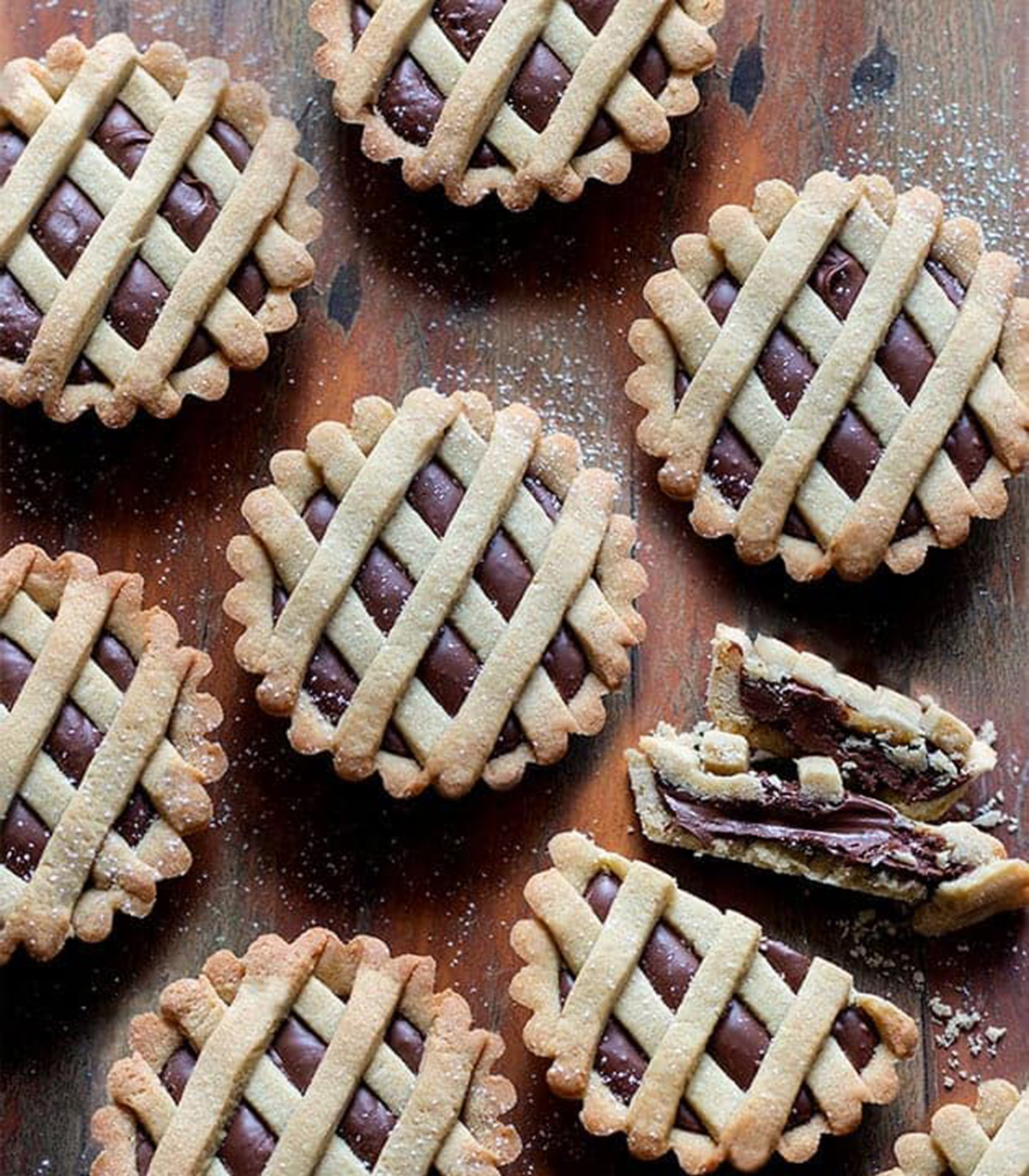 Italian Nutella tarts on a wooden board.
