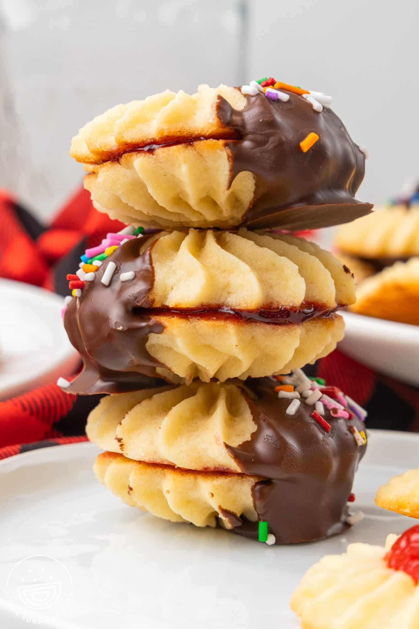 Italian butter cookies with jam, piled.