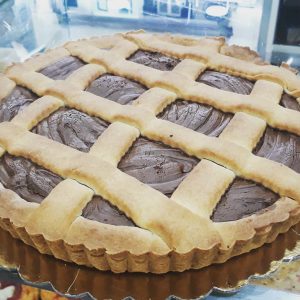 Crostata, nutella tart photo on a table.