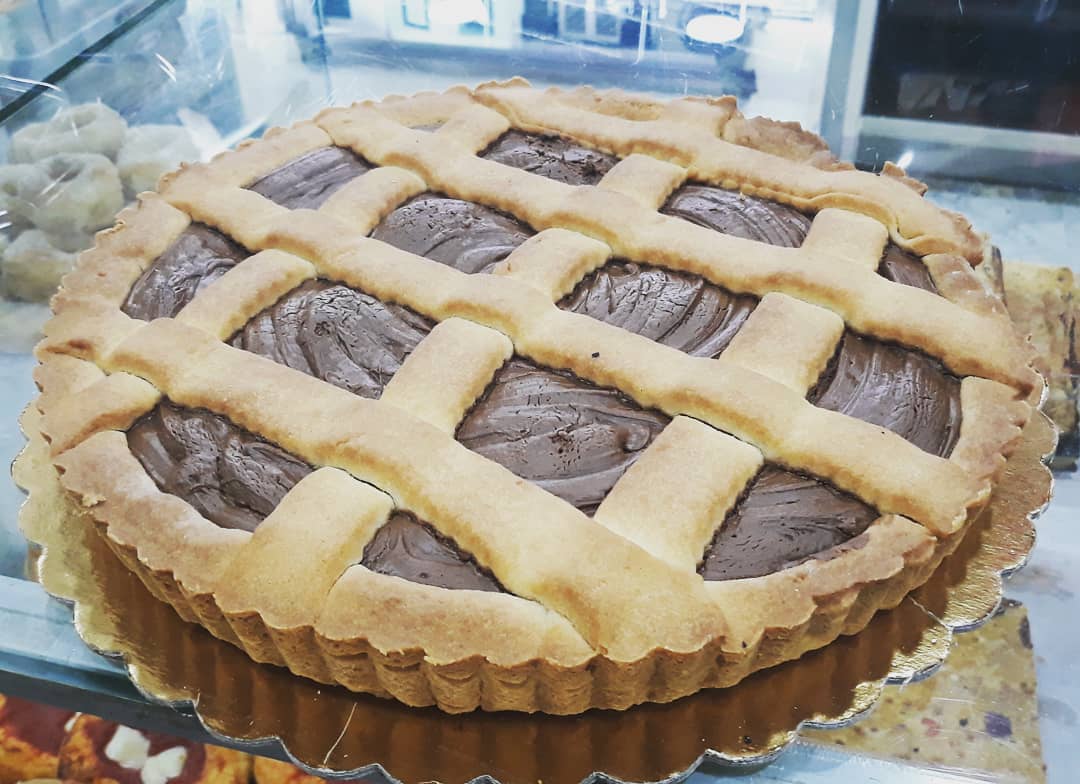 Crostata, nutella tart photo on a table.