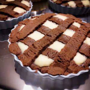 Ricotta tart on a table, ready to eat.